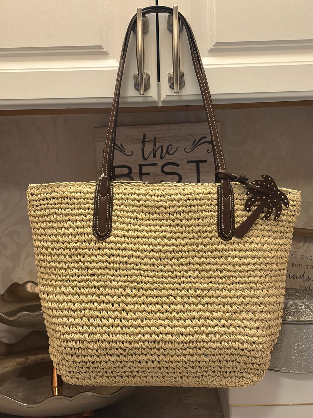 Straw Tote Bag with Brown Leather Handles and hand wristlet